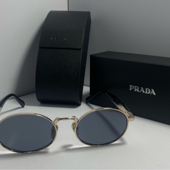 Prada Women's Sunglasses with Gold Frame and Gray Lenses - Picture 1 of 9